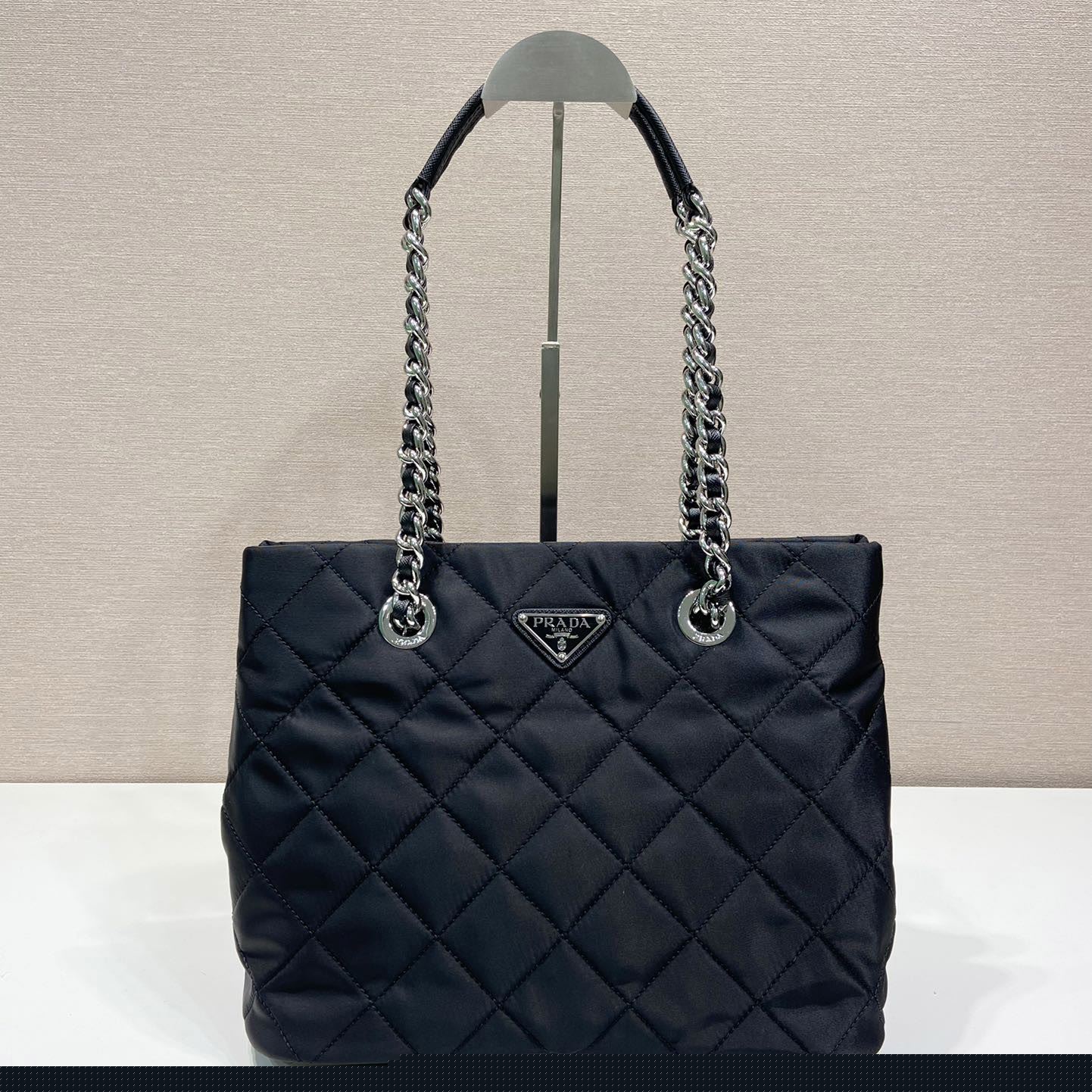 Pra*a top handle bags